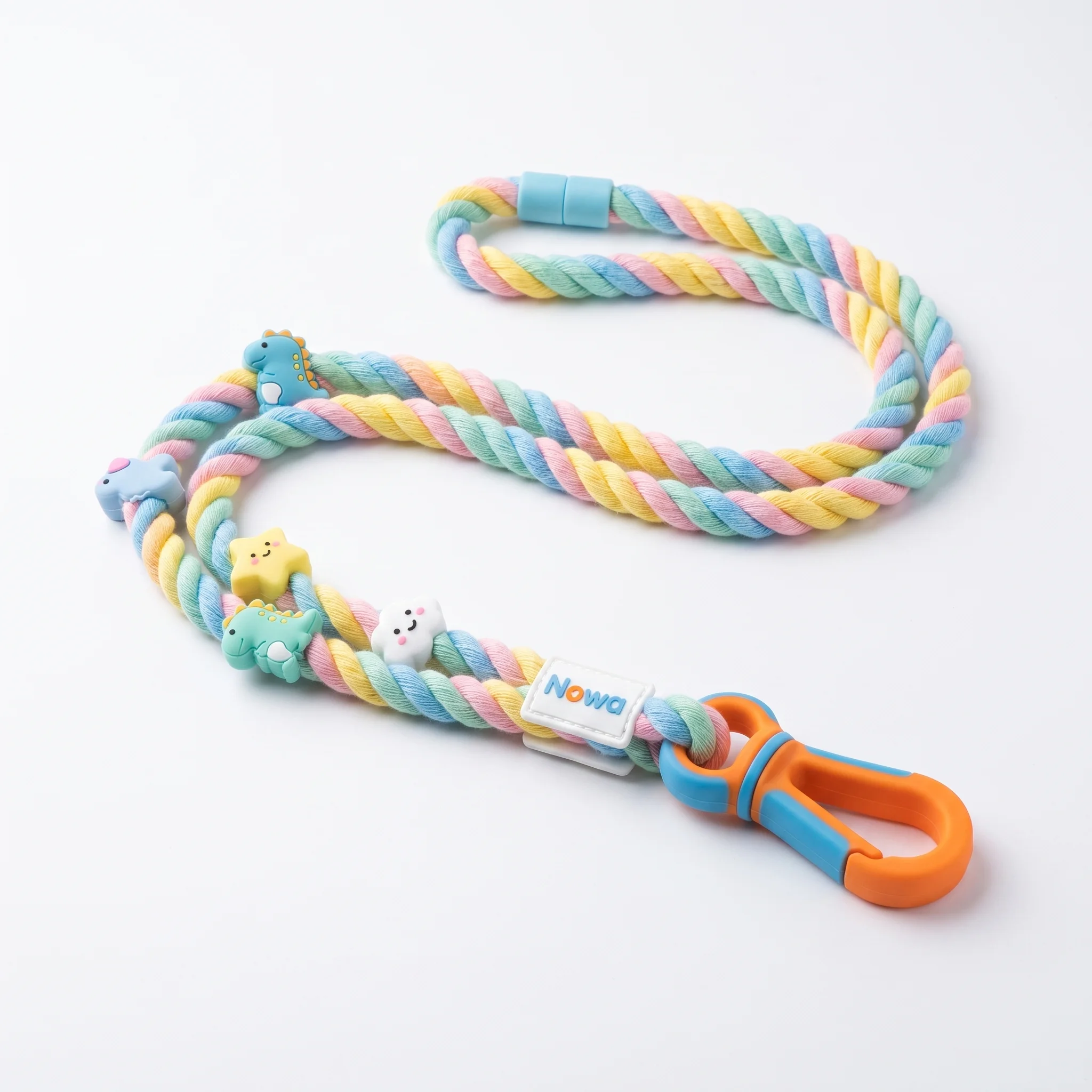 Rainbow lanyard with dino, star, and cloud charms